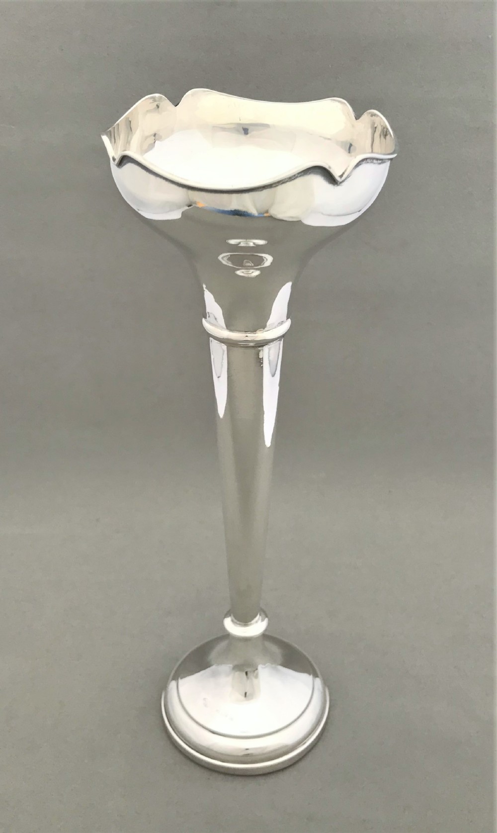 A handsome large silver stem vase