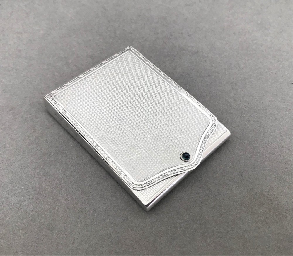 A gorgeous Art Deco silver match book holder