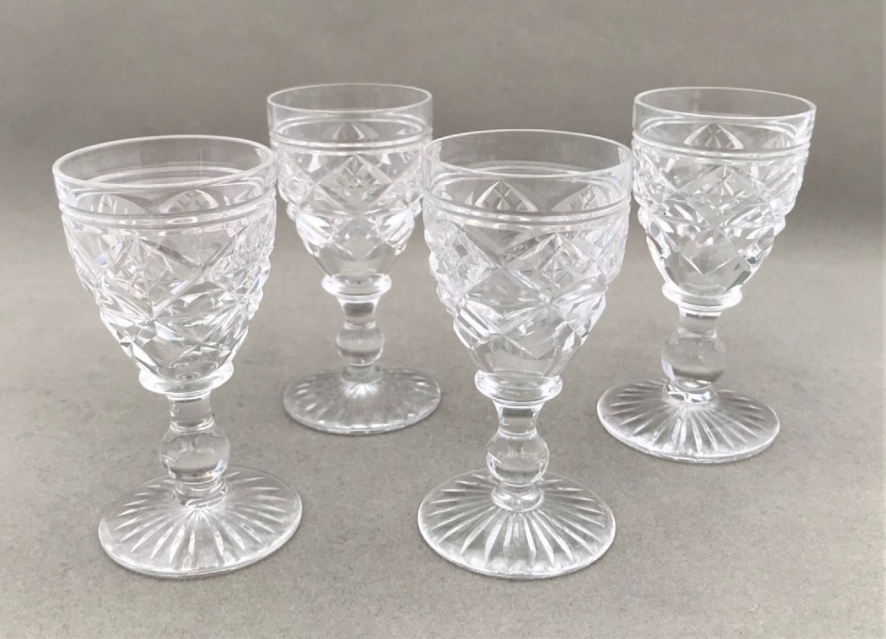 A charming set of 4 Stuart Crystal liqueur glasses