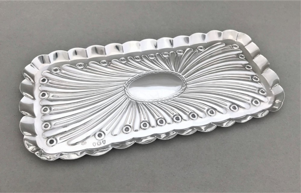 A stylish William Comyns Victorian silver pen tray