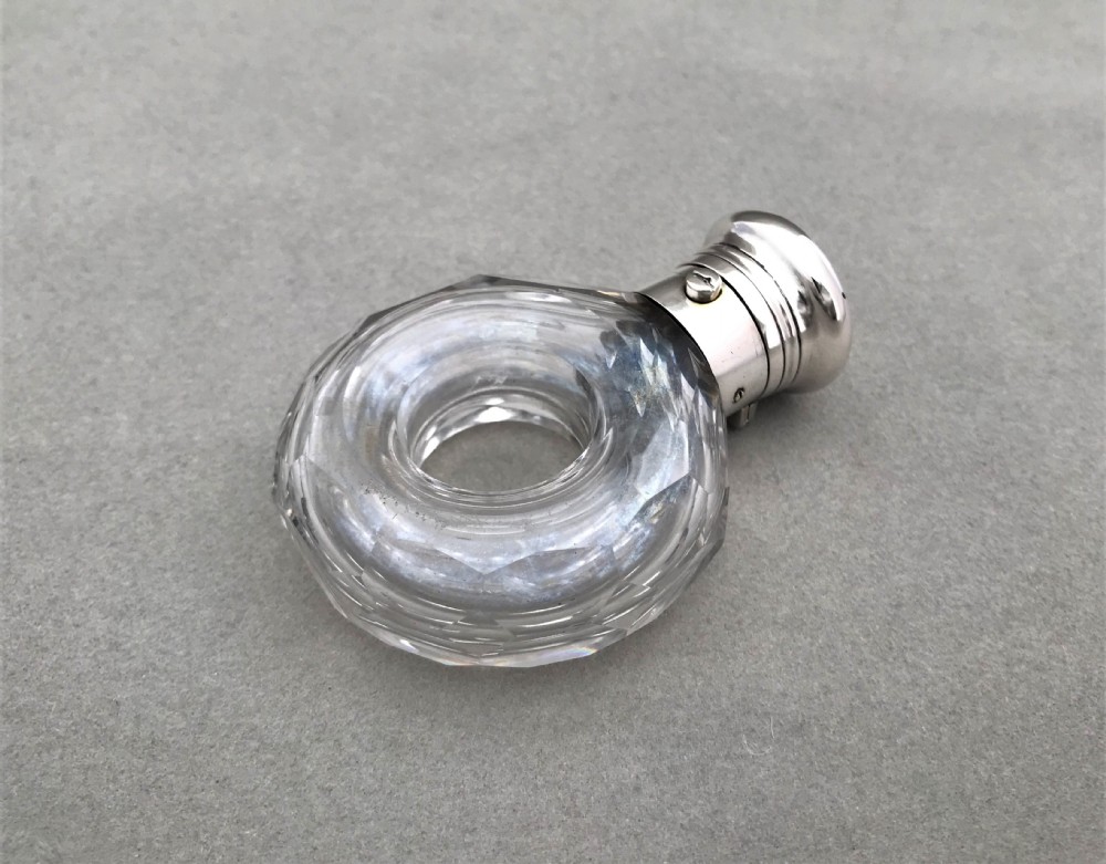 A fabulous silver mounted Victorian scent bottle