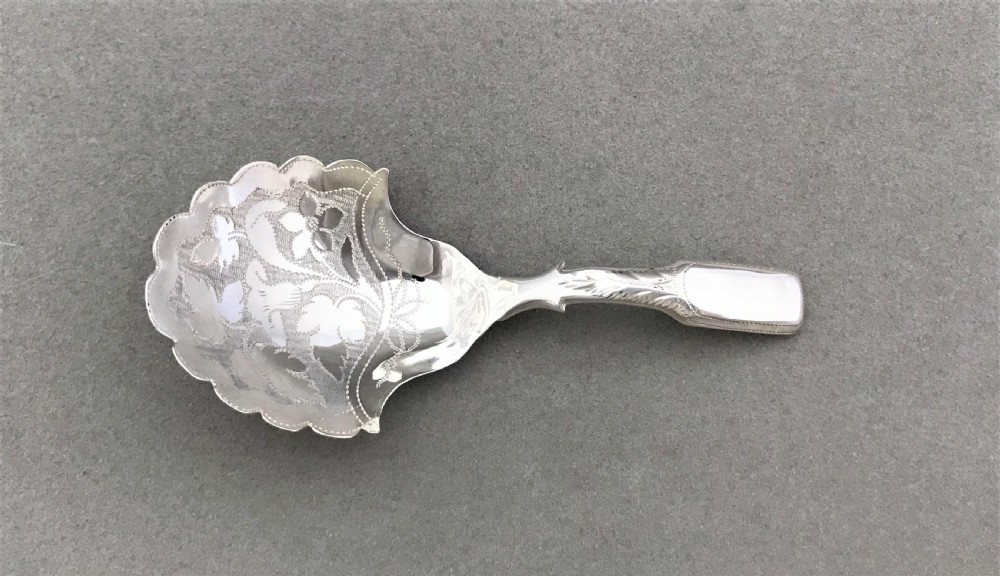An unusual Georgian silver caddy spoon View VII