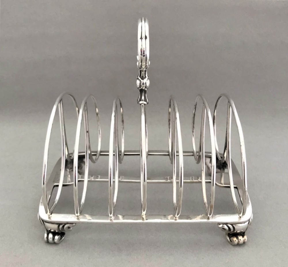 An outstanding large Victorian silver toast rack by Garrards View II