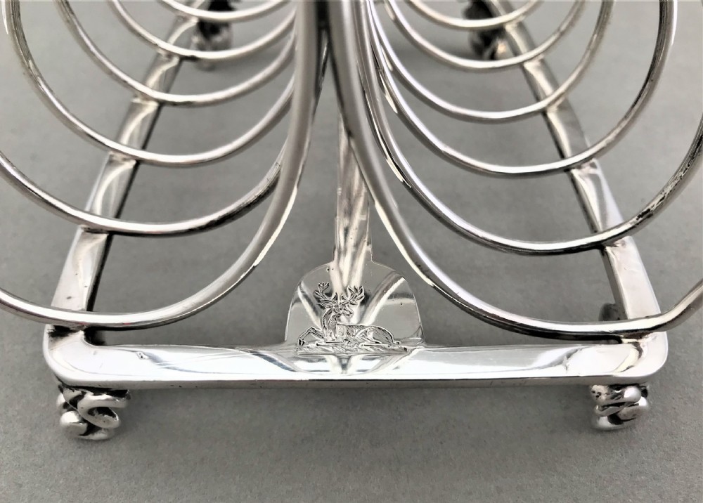 An outstanding large Victorian silver toast rack by Garrards View III