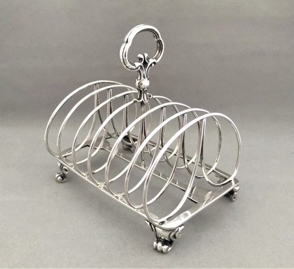 An outstanding large Victorian silver toast rack by Garrards View IV