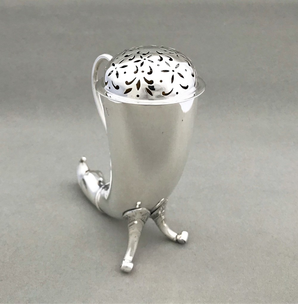 An outstanding Irish silver 'cornucopia' silver sugar caster View III