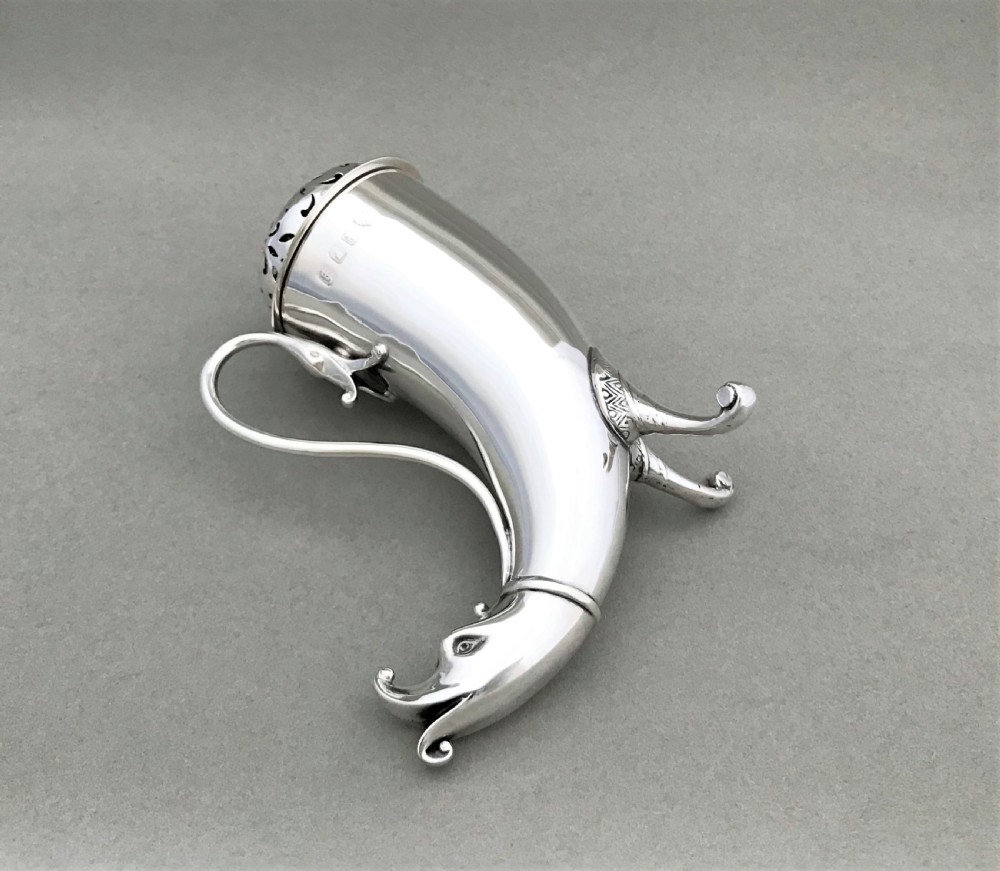 An outstanding Irish silver 'cornucopia' silver sugar caster View V