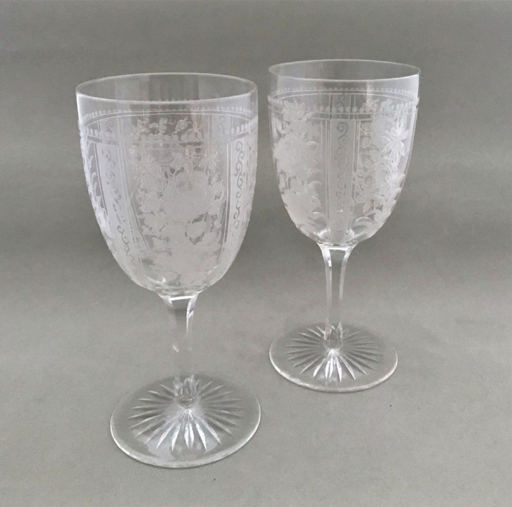 A superb pair of Victorian etched wine goblets