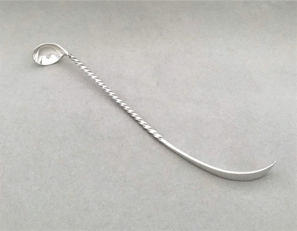 An extremely rare Victorian silver olive or pickle spoon View III