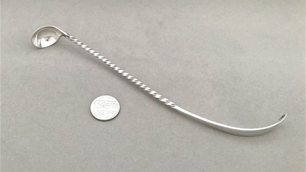 An extremely rare Victorian silver olive or pickle spoon View V