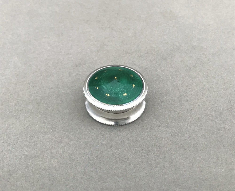 An exquisite Edwardian silver & guilloche enamel pill box
