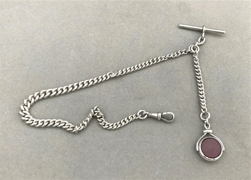 A wonderful Victorian silver Albert chain and fob View II