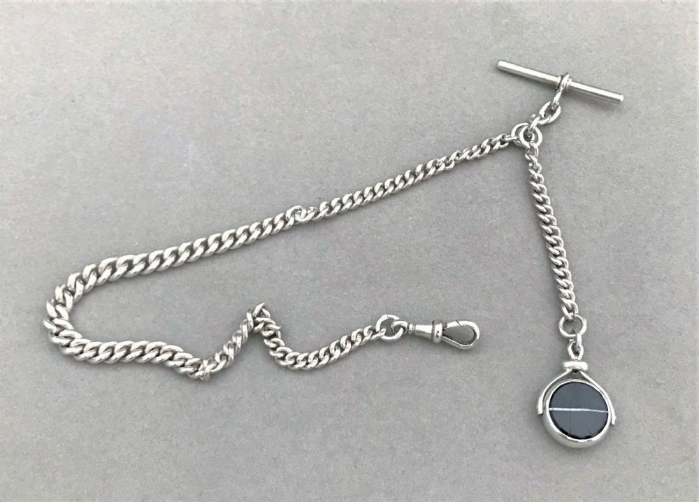 A wonderful Victorian silver Albert chain and fob