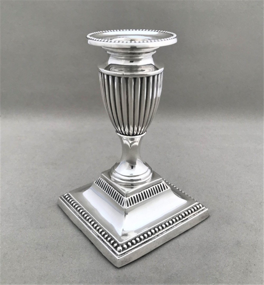 A superb pair of Edwardian half height silver candle sticks View IV