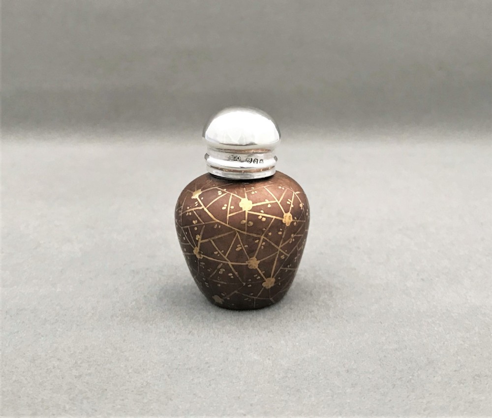 A rare Victorian silver mounted novelty scent bottle
