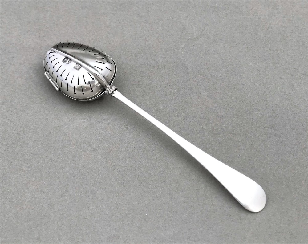 A rare Victorian silver tea infuser of patented design