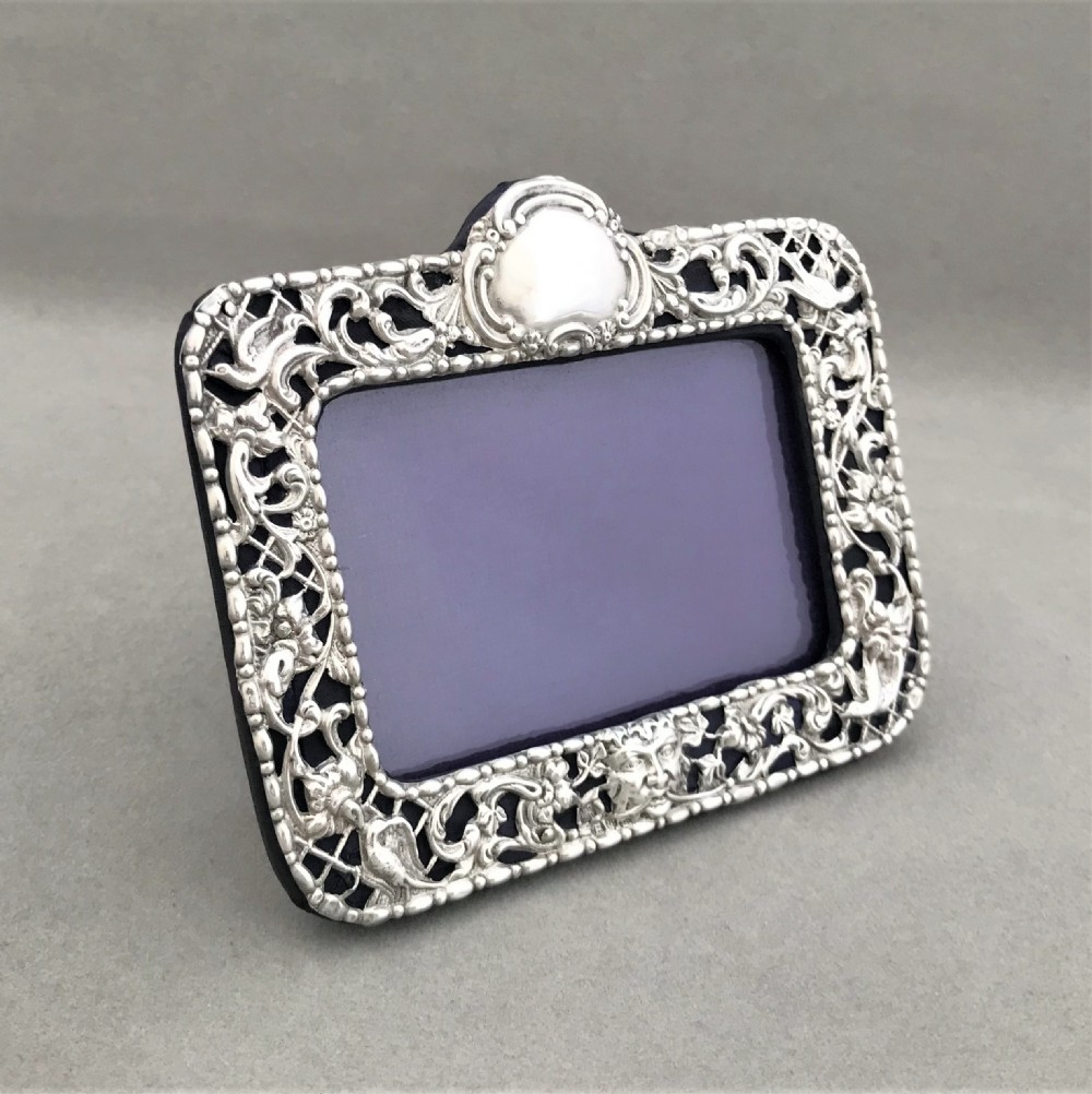A Victorian Chester silver landscape photo frame