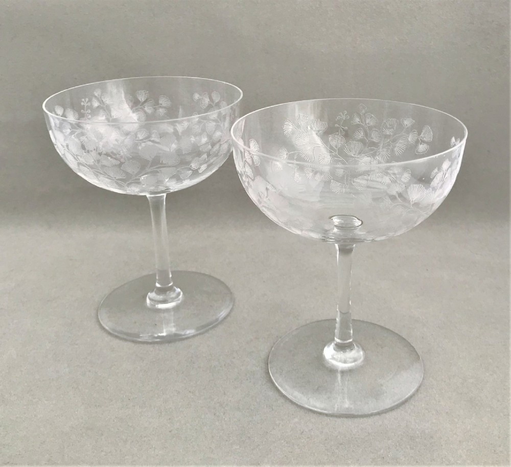 A gorgeous pair of Victorian etched champagne glasses