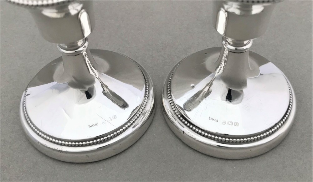 A good pair of dwarf silver candlesticks View III