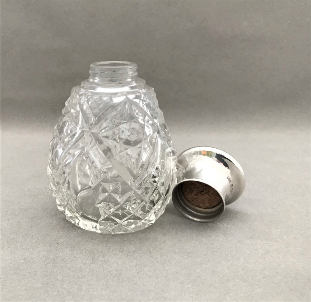 A gorgeous Art Deco small silver & enamel cologne bottle View V