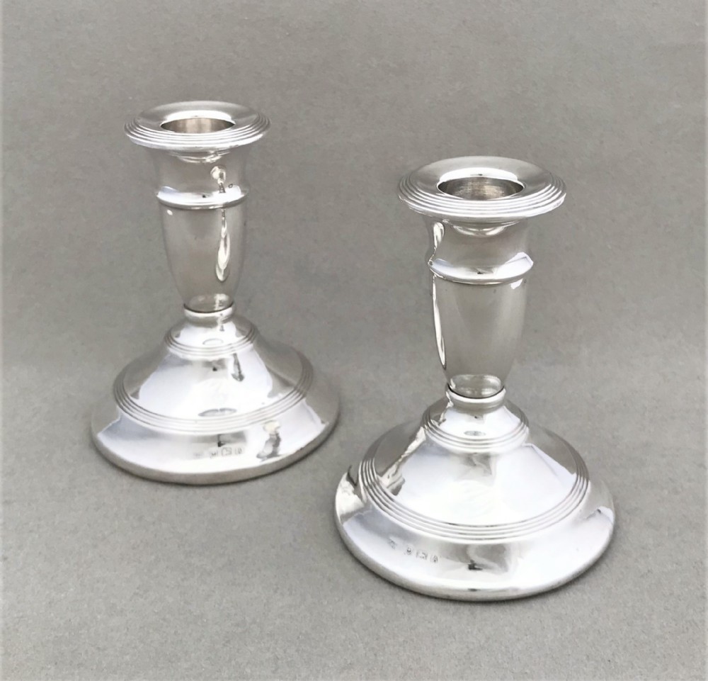 A good pair of dwarf solid silver candlesticks