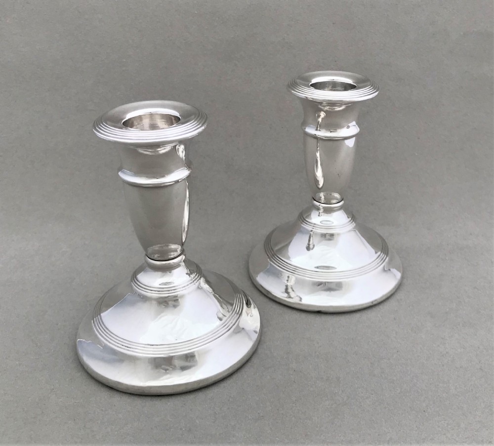 A good pair of dwarf solid silver candlesticks View III