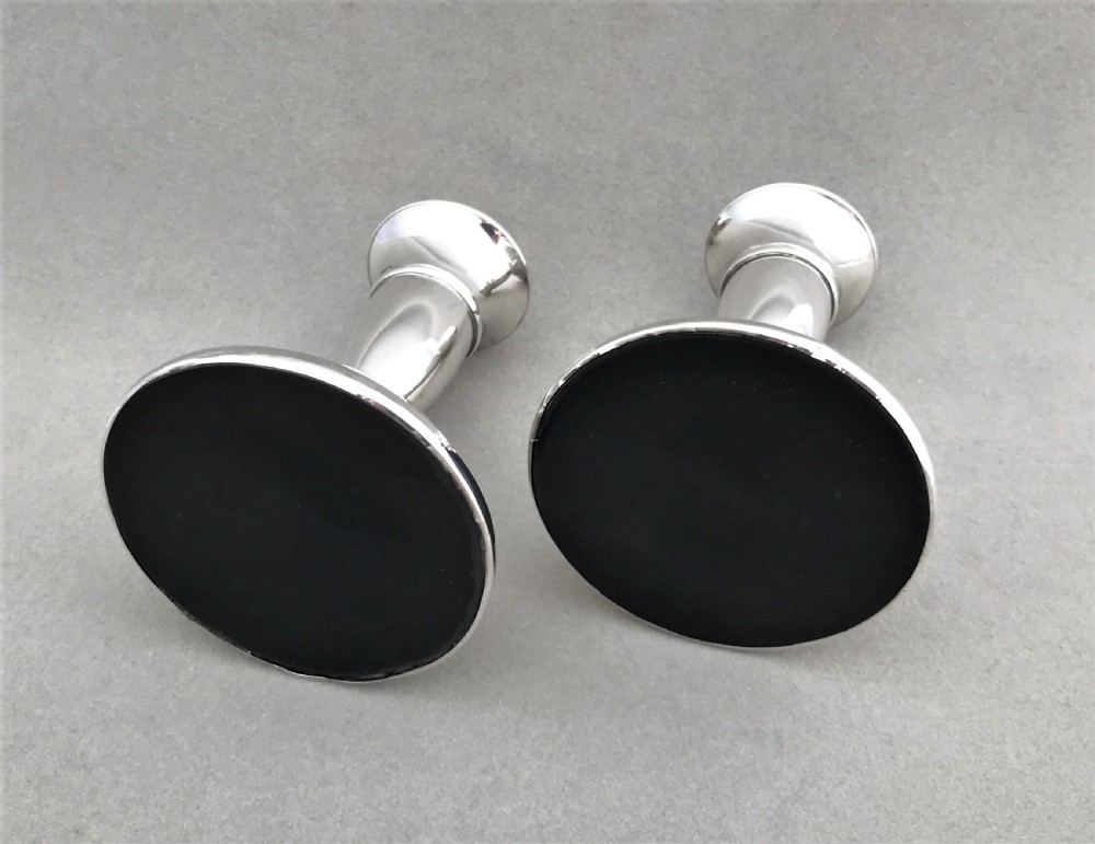 A good pair of dwarf solid silver candlesticks View IV