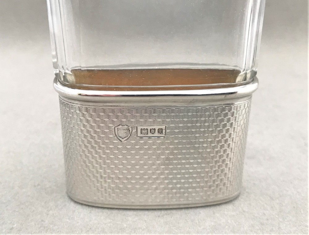 A gorgeous small silver mounted hip flask View V