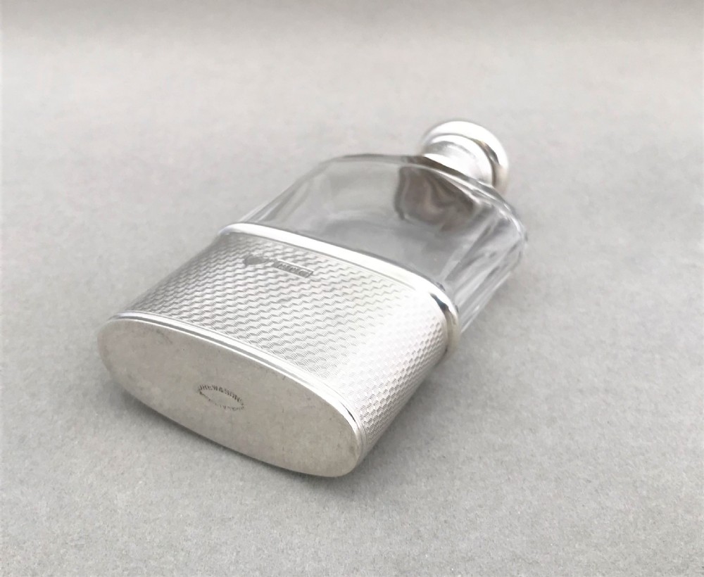 A gorgeous small silver mounted hip flask View VI