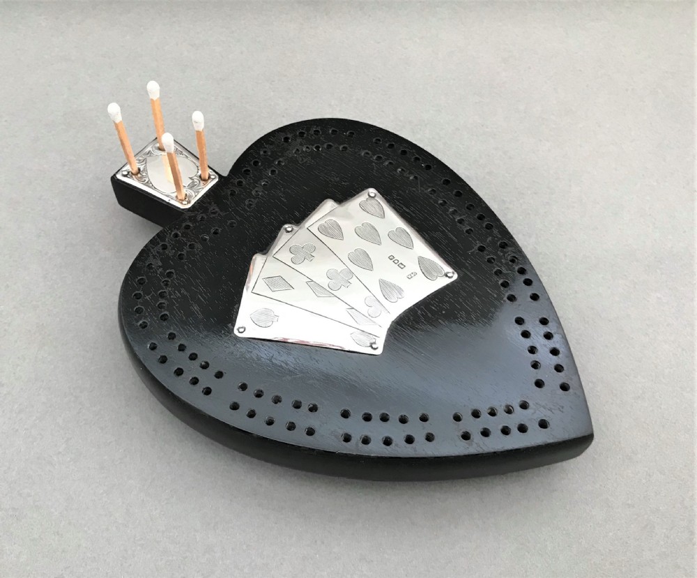 An outstanding Victorian silver mounted cribbage board View II