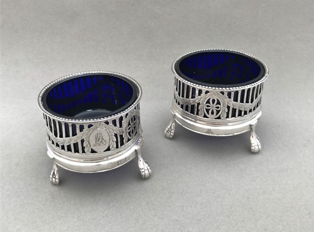 A superb pair of 18th Century silver condiment tubs