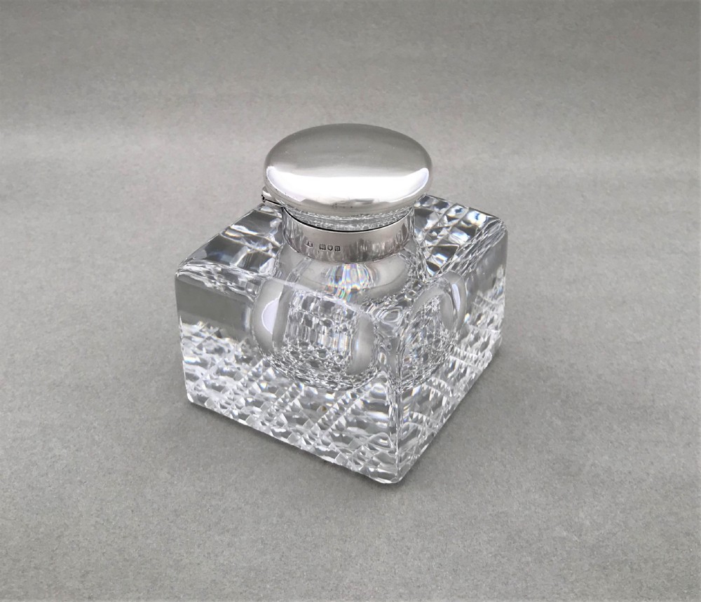 A handsome silver mounted Edwardian inkwell