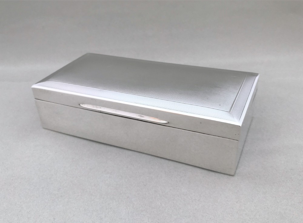 A handsome Art Deco silver cigarette box