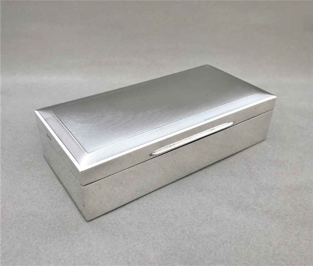 A handsome Art Deco silver cigarette box View II