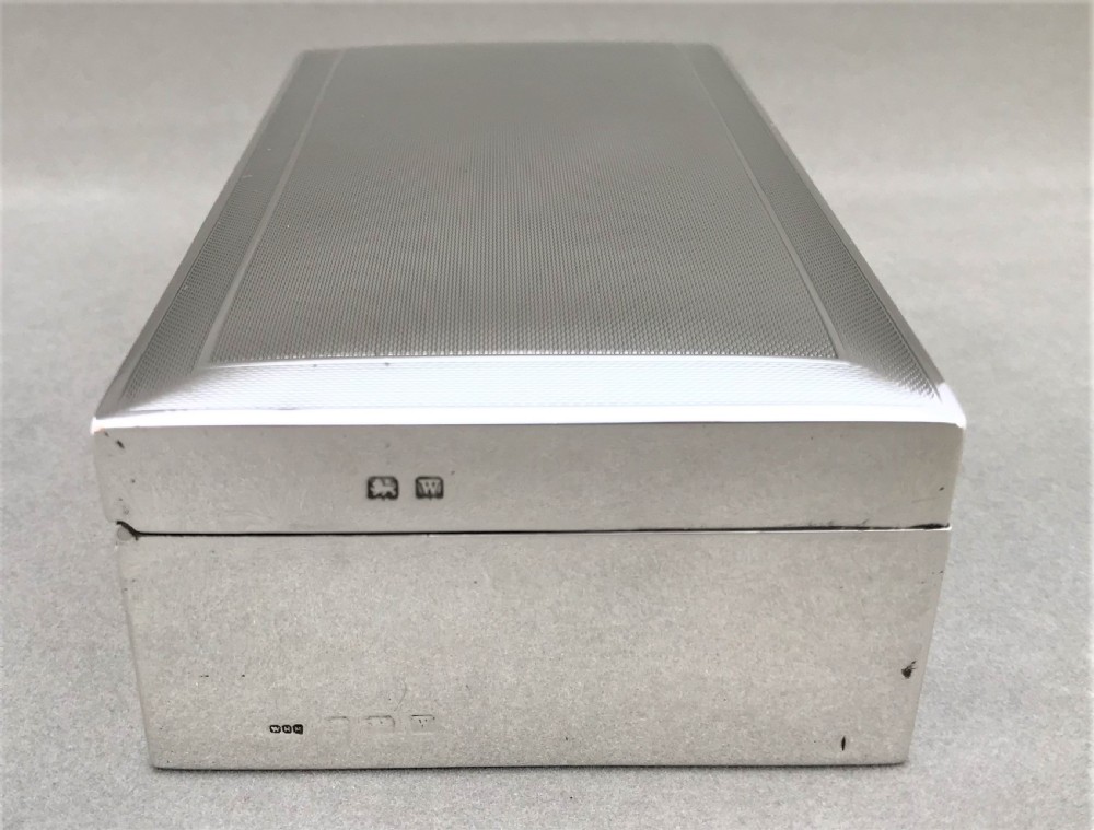 A handsome Art Deco silver cigarette box View VII