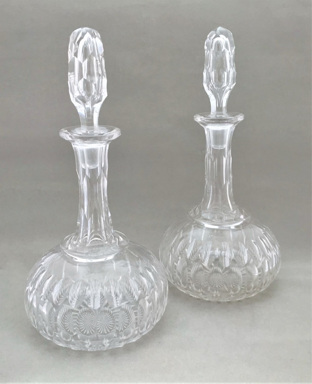 A splendid pair of cut glass Victorian decanters
