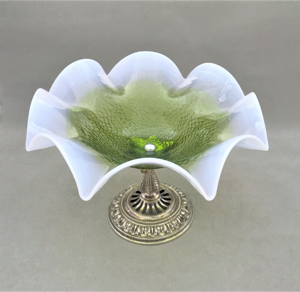 A gorgeous Victorian vaseline glass pedestal dish