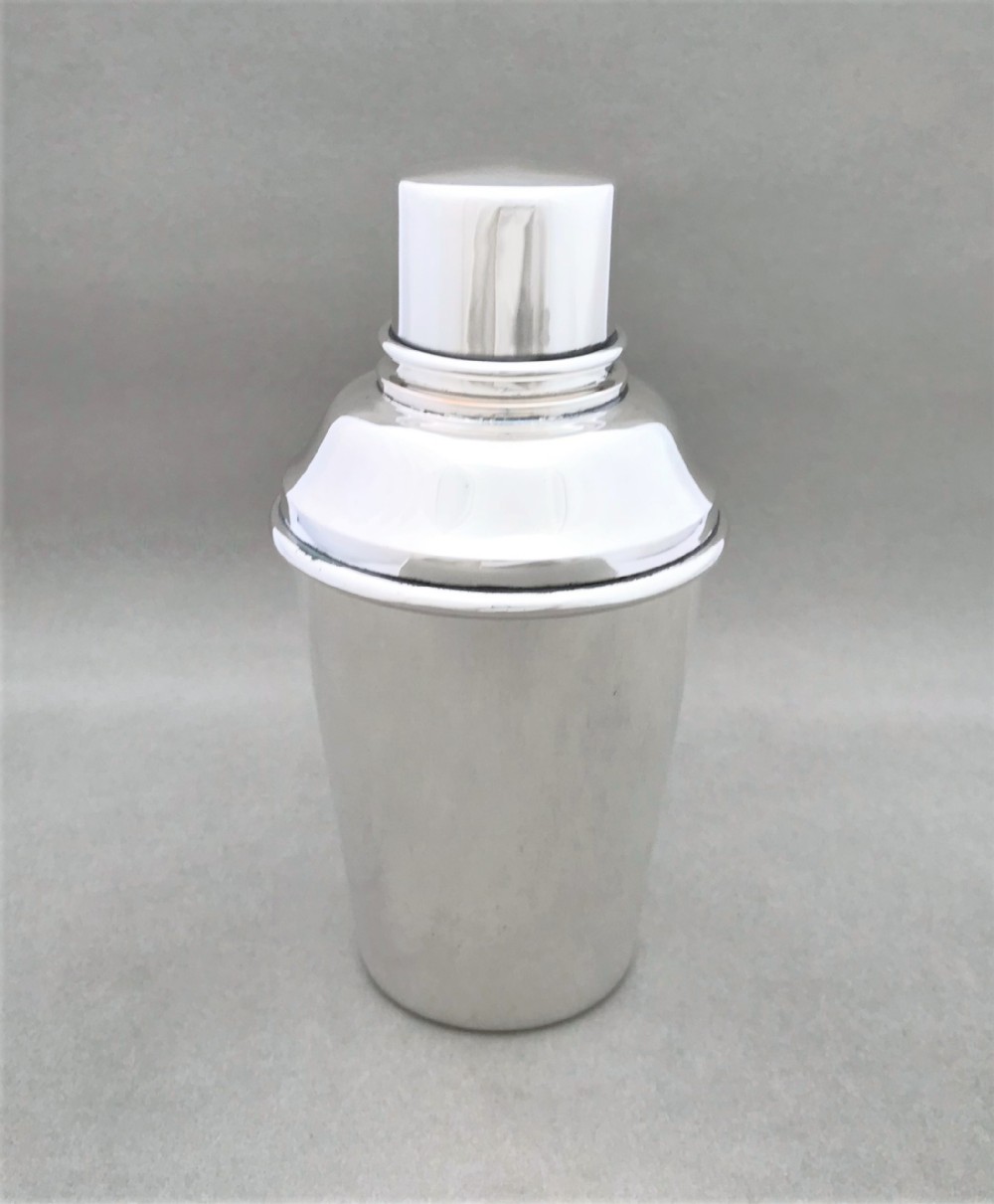 An appealing small silver plated cocktail shaker