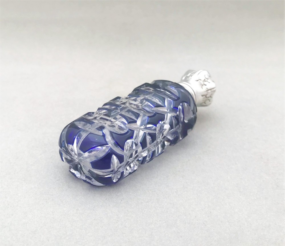 A gorgeous Victorian silver mounted overlay scent bottle View III