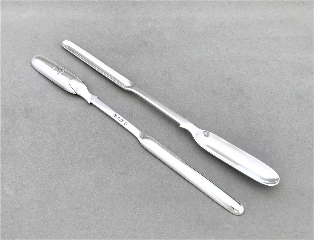 A rare pair of quality Edwardian silver marrow scoops