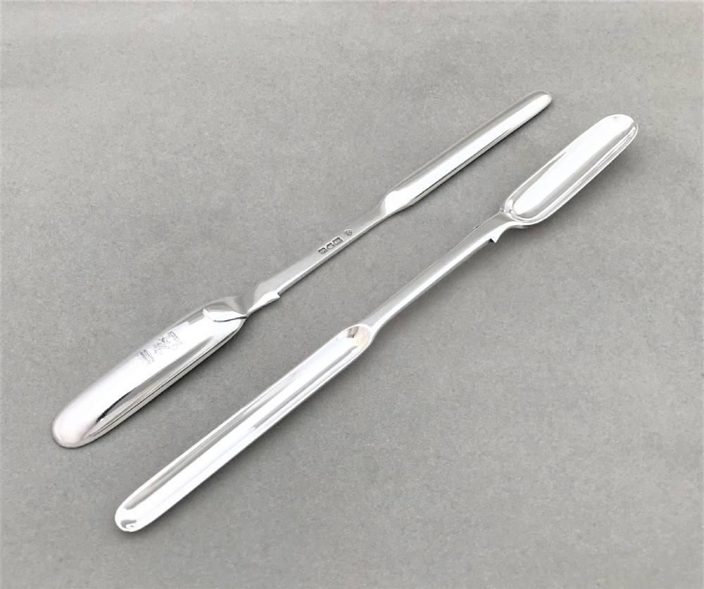 A rare pair of quality Edwardian silver marrow scoops View II