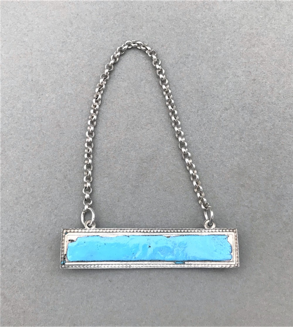 An unmarked silver & enamel Port decanter label View II