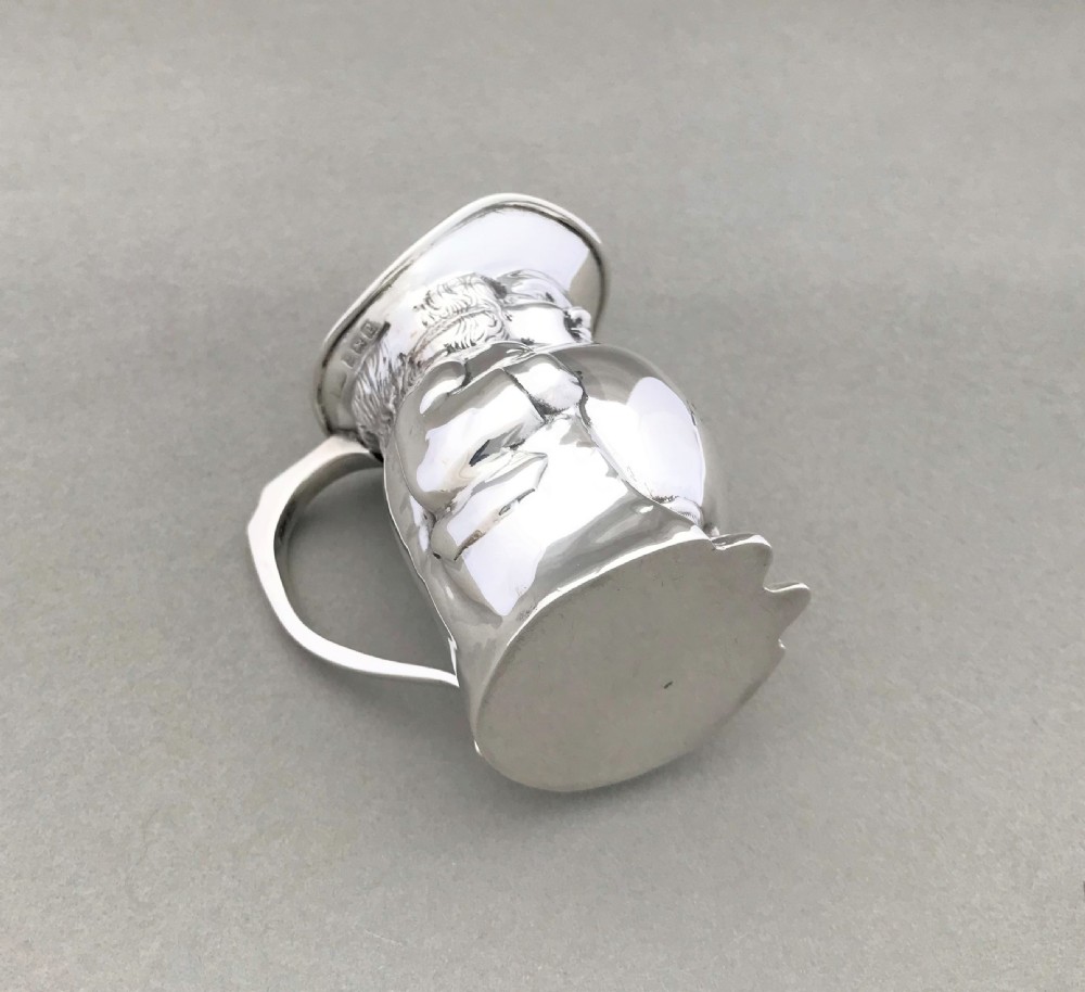 An extremely rare novelty silver Toby cream jug View V