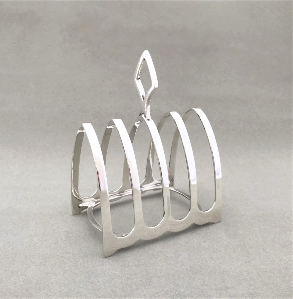 An attractive four slice silver toast rack View II