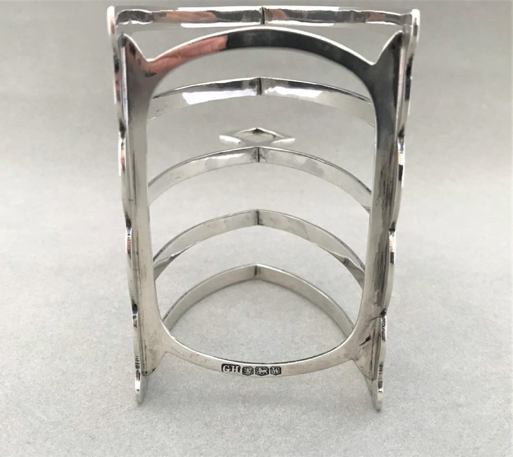 An attractive four slice silver toast rack View III