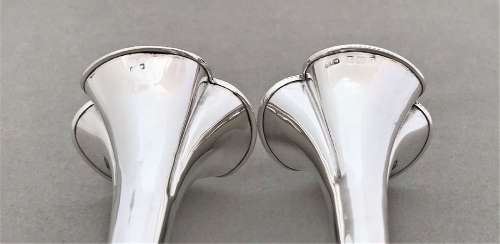 A charming pair of Edwardian silver stem vases View V