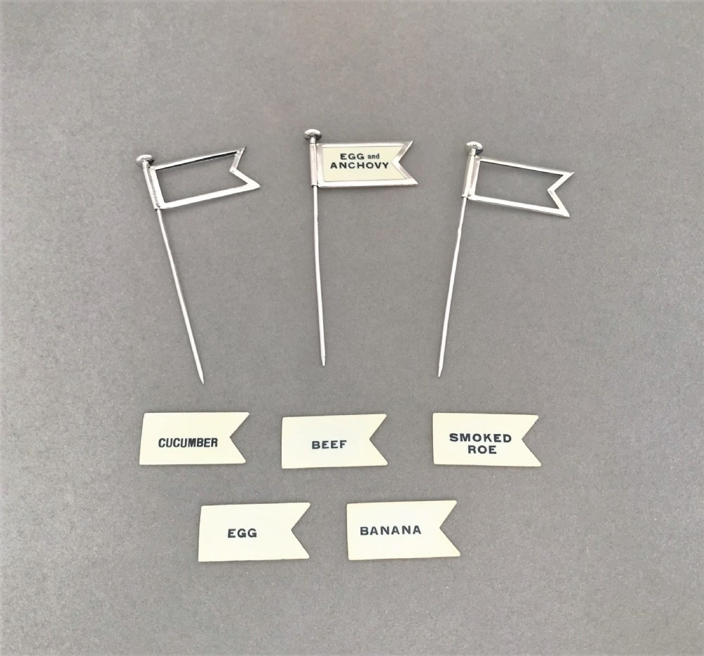 A fabulous set of interchangeable silver sandwich flags
