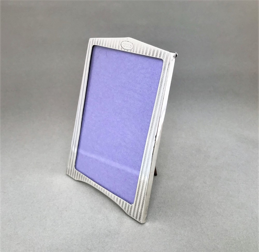 A stylish engine turned silver photo frame