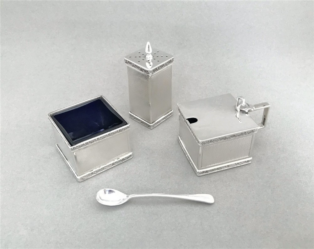 A stylish Art Deco silver three piece cruet View III