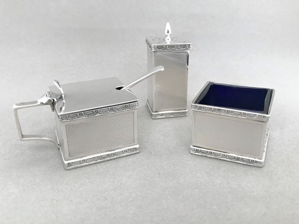 A stylish Art Deco silver three piece cruet View V